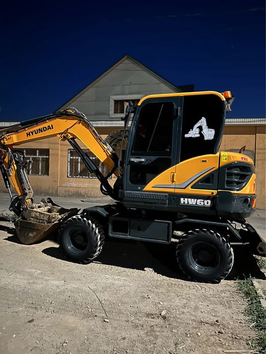 Услуга трактора экскаватора погрузчика