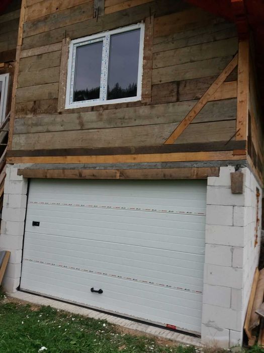 Uși garaj secționale izolate – comandă rapidă Marketroll