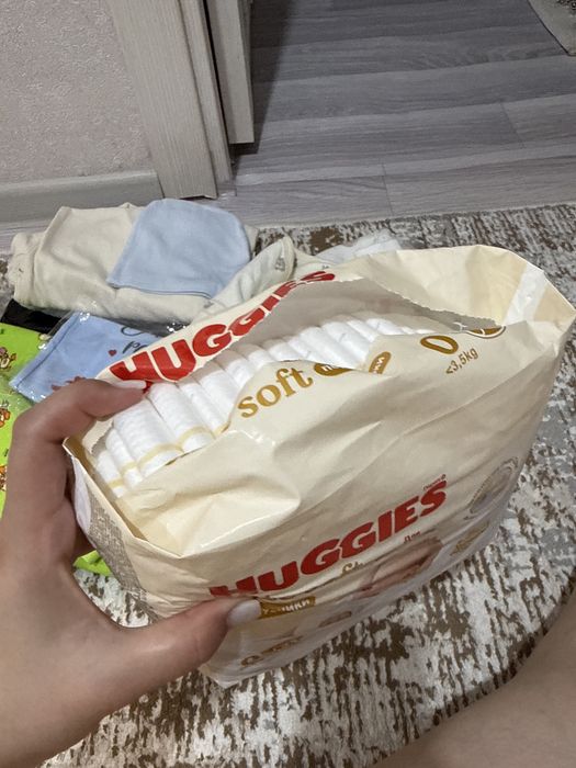 Пакетик с одеждой для новорожденного