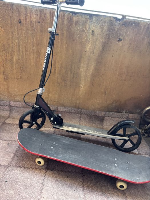 Продам самокат с доской