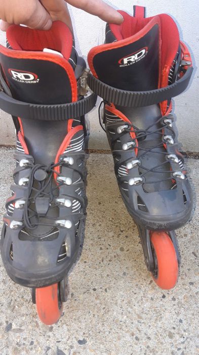 Роликовые коньки