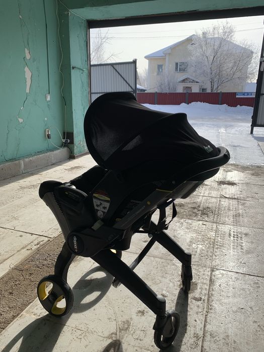 Продается коляска-автокресло Doona Grey Hound