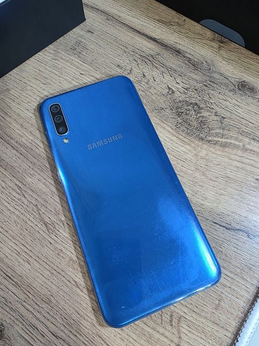 Самсунг а50 64гб