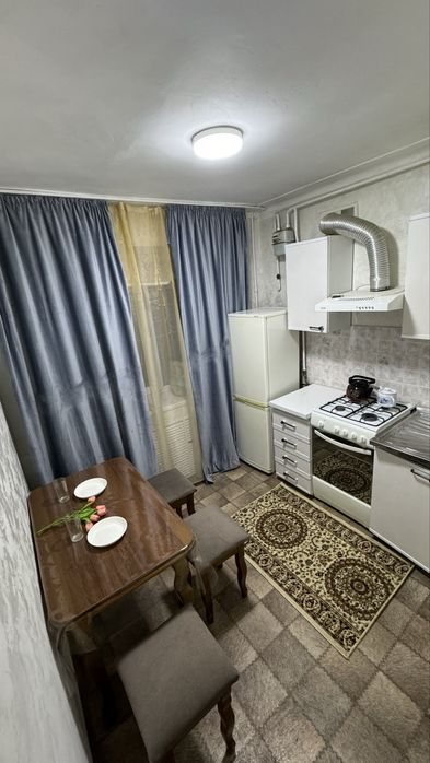 По часам в центре 2000