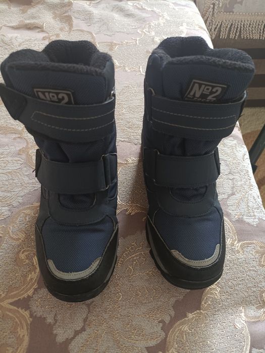 Продам зимние сапоги аляски