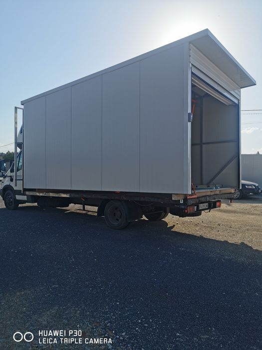 Произвежда гаражи от термопанели