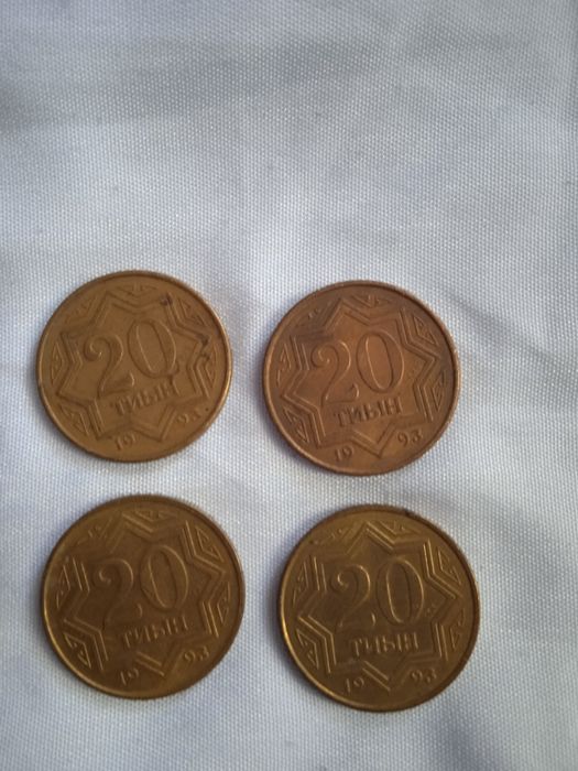 Монеты - тиыны .