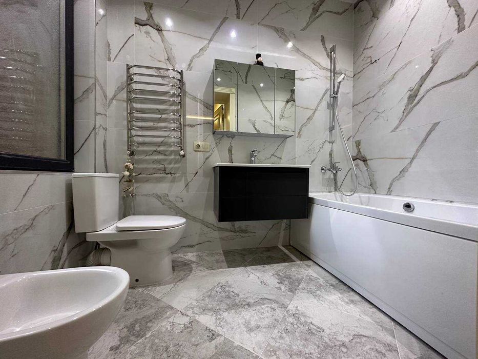 Буйук Ипак Йули ул.Сайрам ,Буз Базар евро дом 3.2 сот.450 кв.м 7 ком