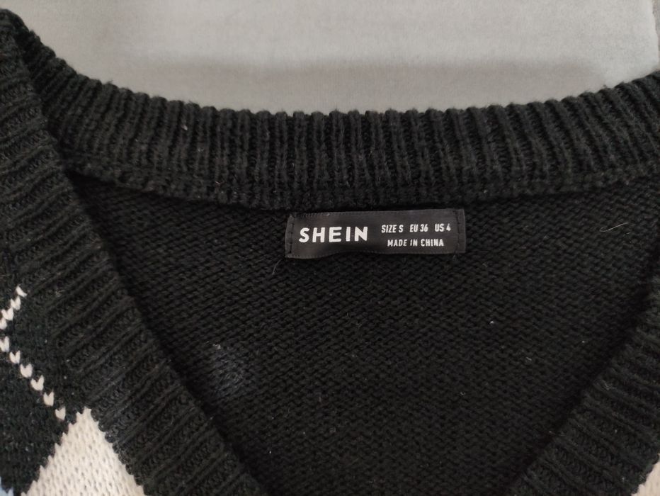 жилетка         .