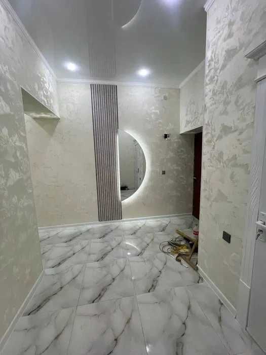 Янги кизил гиштли  домдан 2 хонали евротамирланган квартира сотилади