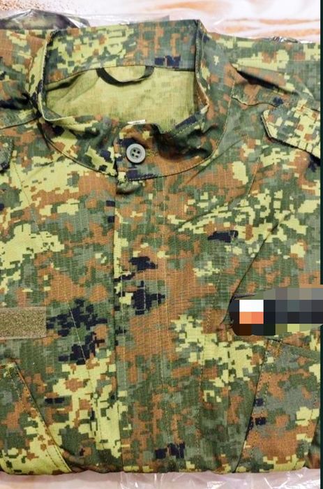 Камуфлажни дрехи