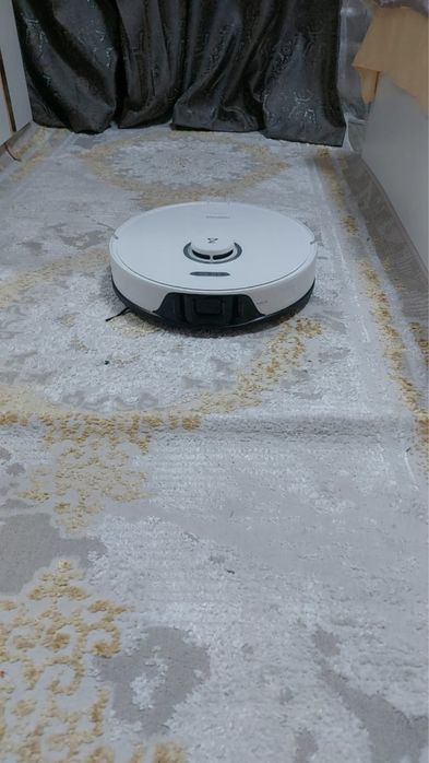 Робот пылесос.