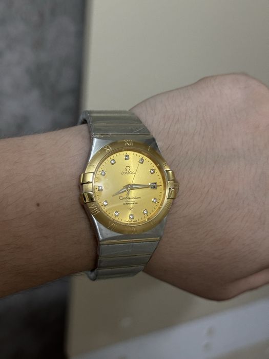 Часы Omega новый