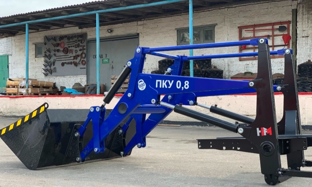 Кун Пку 0.8. Фронтальный погрузчик.