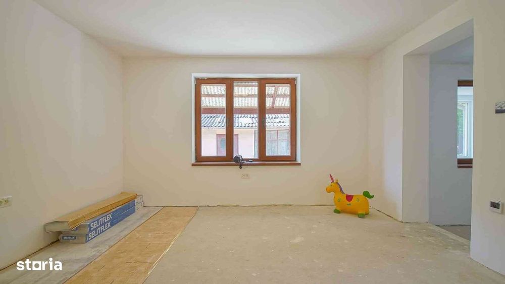 Casă renovată în Feldioara Brasov cu încălzire în pardoseală