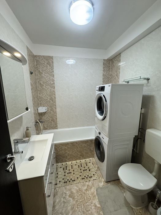 Proprietar inchiriez  2 camere cu loc de parcare