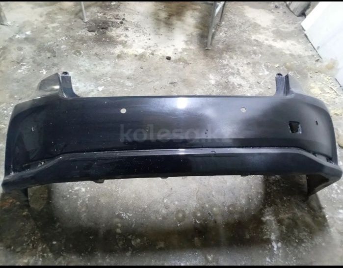 Задний бампер Тойота corolla