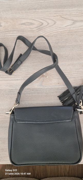 Poseta Gucci, nu este originala