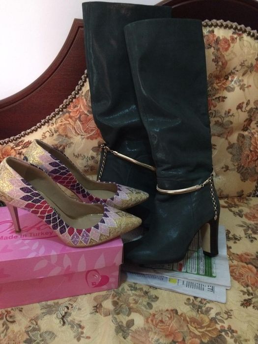 Новые женские сапоги