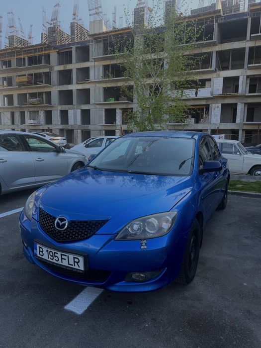 Mazda 3 an 2004 benzina