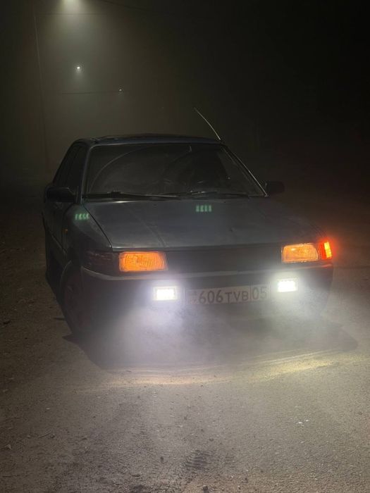 Мазда 323 на ходу