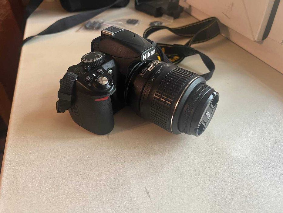 Nikon D3100 + 18-55mm