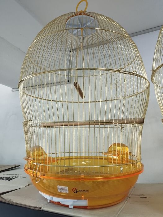 Продаю золотую клетку для птиц