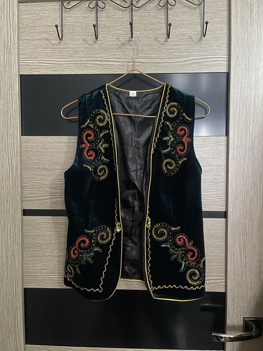 Жеңсіз әйелдер камзолы