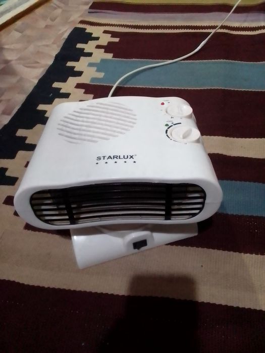 Обогреватель масляный.камин условно.