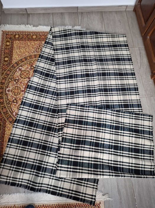 Covoar vechi de tip traversă