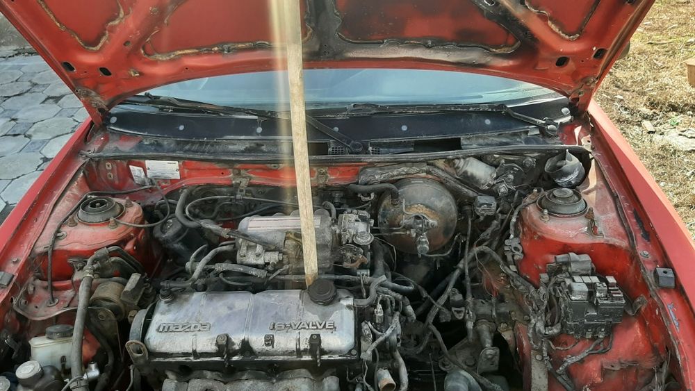 Машина мазда 323
