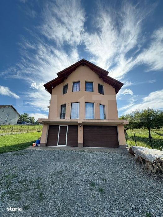Casa de vanzare 140 mp, 5 ari teren, garaj interior – zona Pensiunea