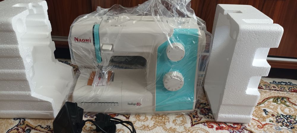 Электрическая швейная машина