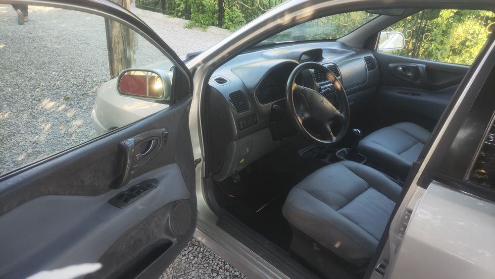 Митсубиси. Mitsubishi space star.