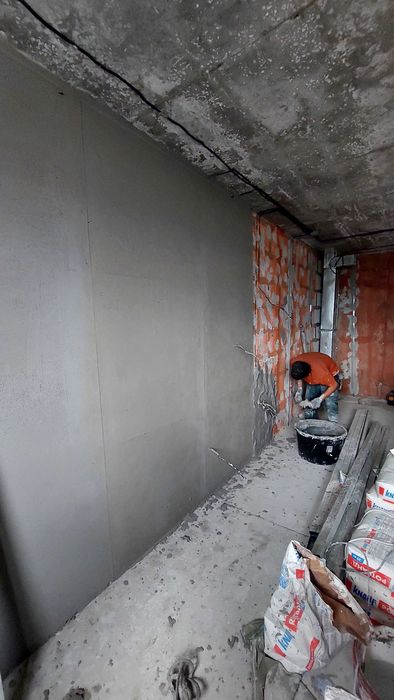 Штукатурка стены
