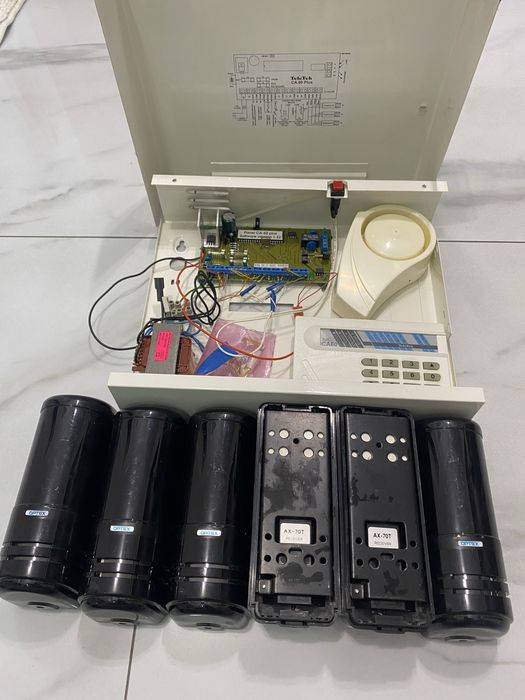 OPTEX – външни периметрови бариери + TeleTek СОТ централа