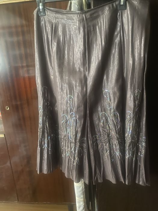 Продам юбку х/б с рисунками из люрикса сплисированную