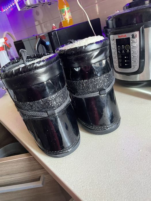 Cizme de zapada imblanite .