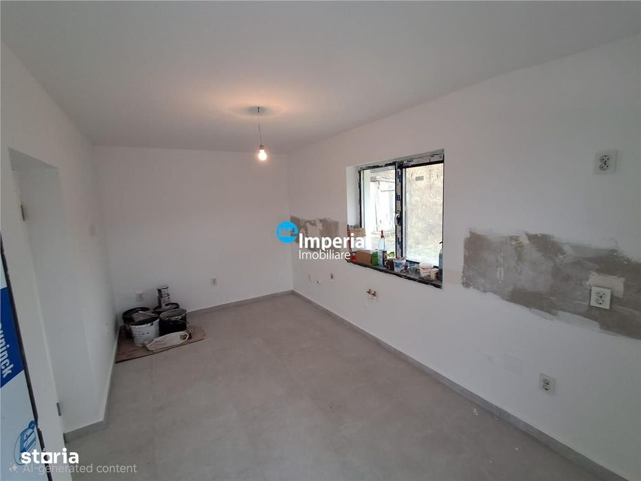 Casa plan parter de vanzare in zona Bucium Visan