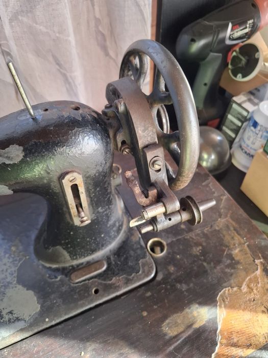 Masina de cusut Singer Ruseasca