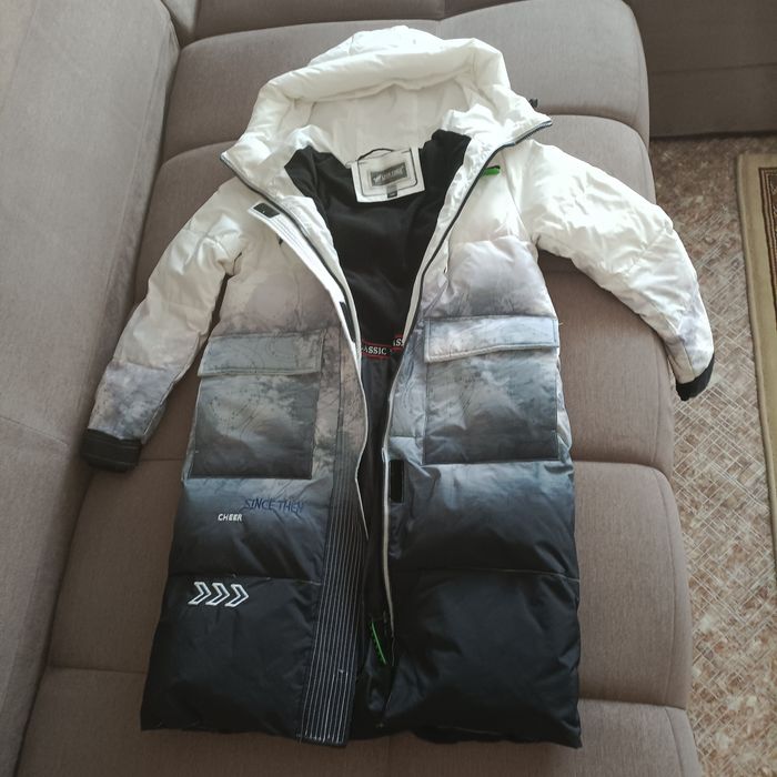 Продаю зимний пуховик