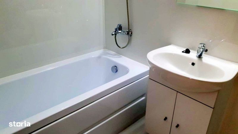 Apartament cu doua dormitoare, parcare proprie, mobilat si utliat