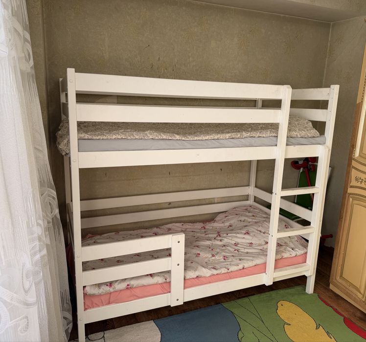 Двухярусная детская кровать