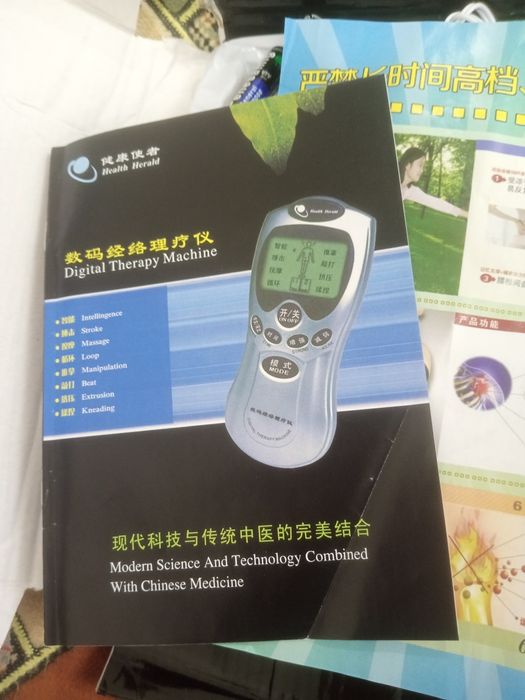 Массажёр для ног с электроподогревом.