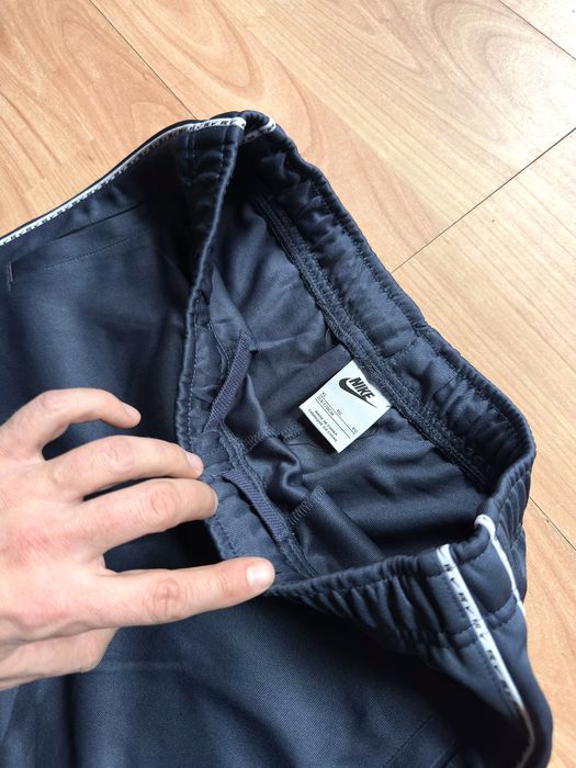 Pantaloni training pants joggers tapered leg Nike blue poliester