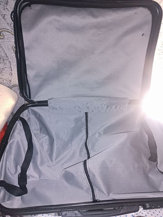 Чемодан марки Baggin Polo.