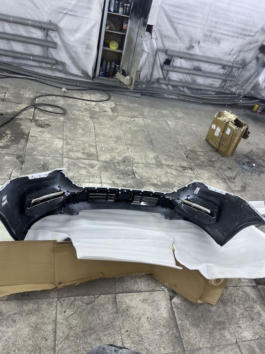 Бампер ОМОДА S5 привозной