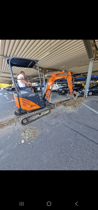 Miniexcavator Bobcat de inchiriat  pentru nivelare teren /demolari/defrisare/sapaturi/fundatii/canalizari/descarcare mecanizata paleti etc