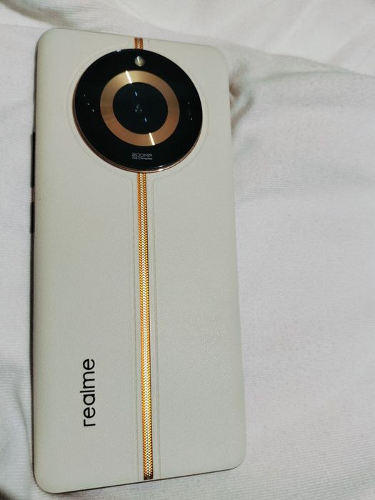 Realme 11pro plus 12/512GB Media Tek Dimensity 7050 protsessor