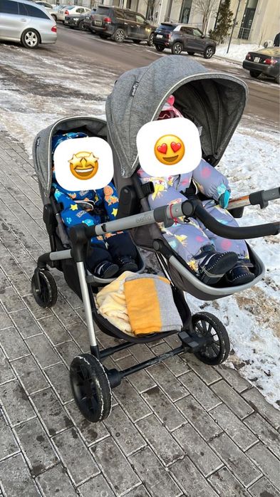 Двойная детская коляска